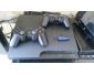 Ps3 avec 2 manettes avec le micro et jeux