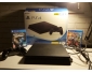 Ps4 slim 1to avec garenti et deux jeux